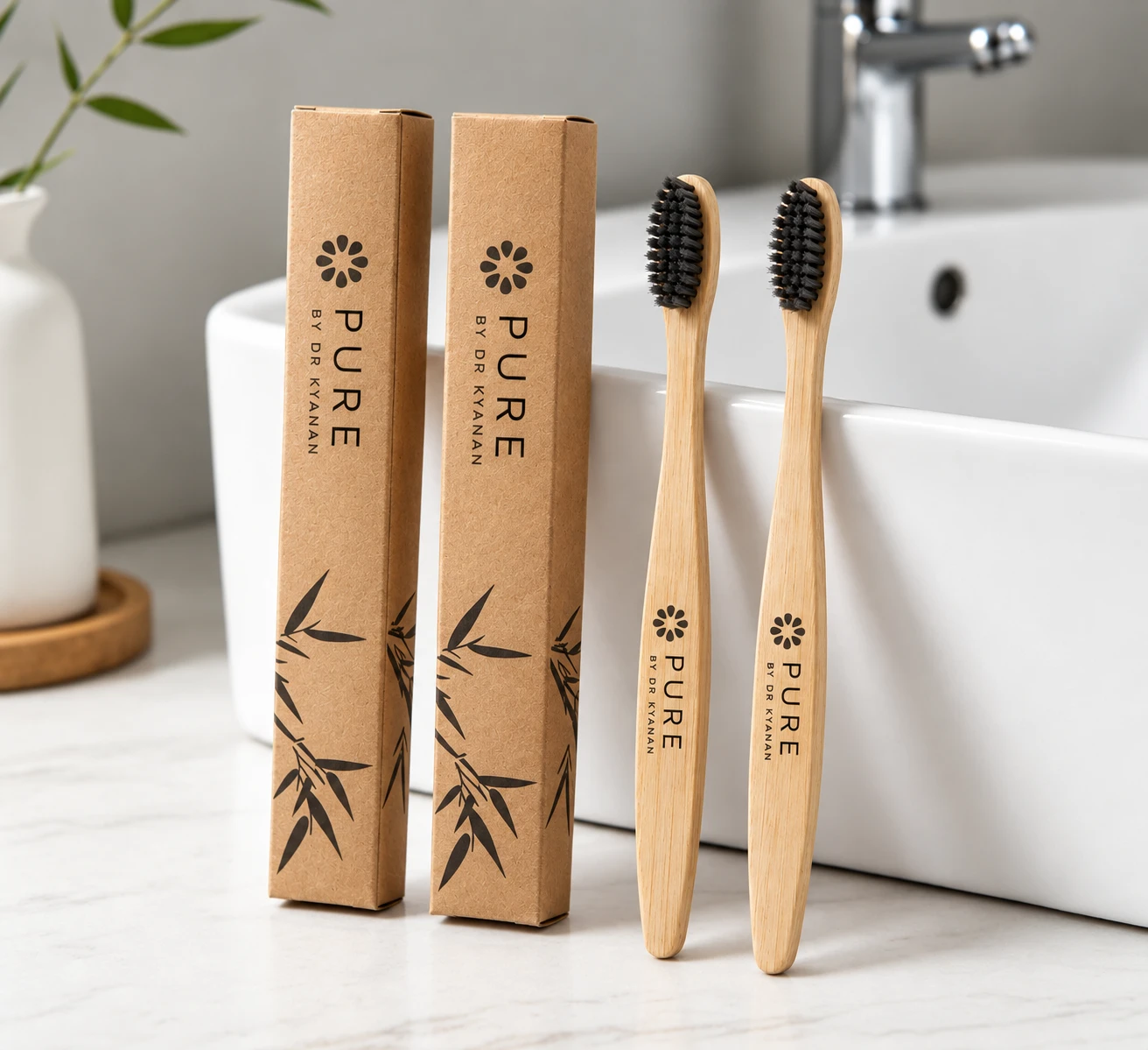 Pure by Dr Kynan bamboo-handled toothbrushes with horse hair bristles, shown with their kraft packaging